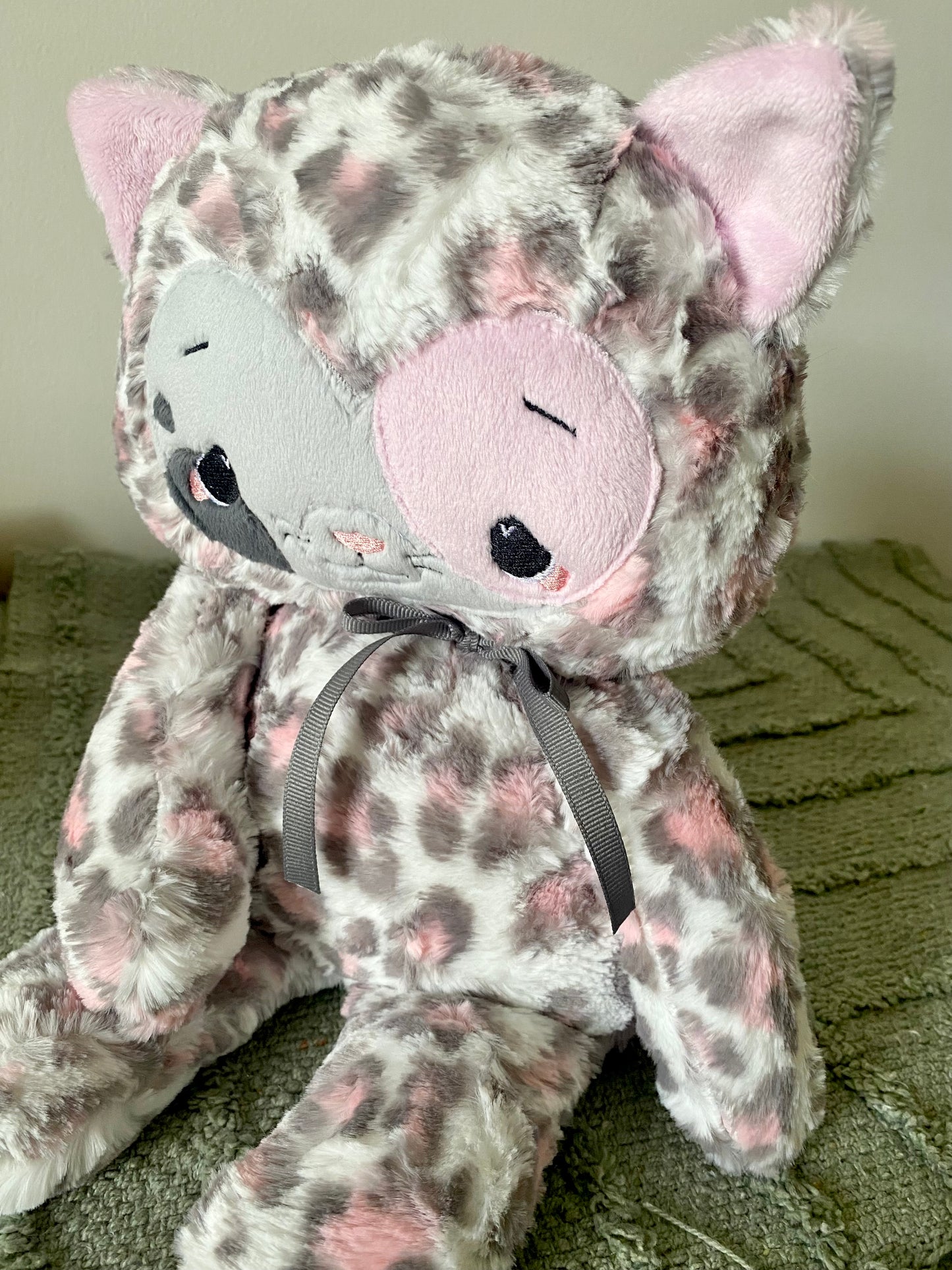 Cleo the pink gray leopard kitty