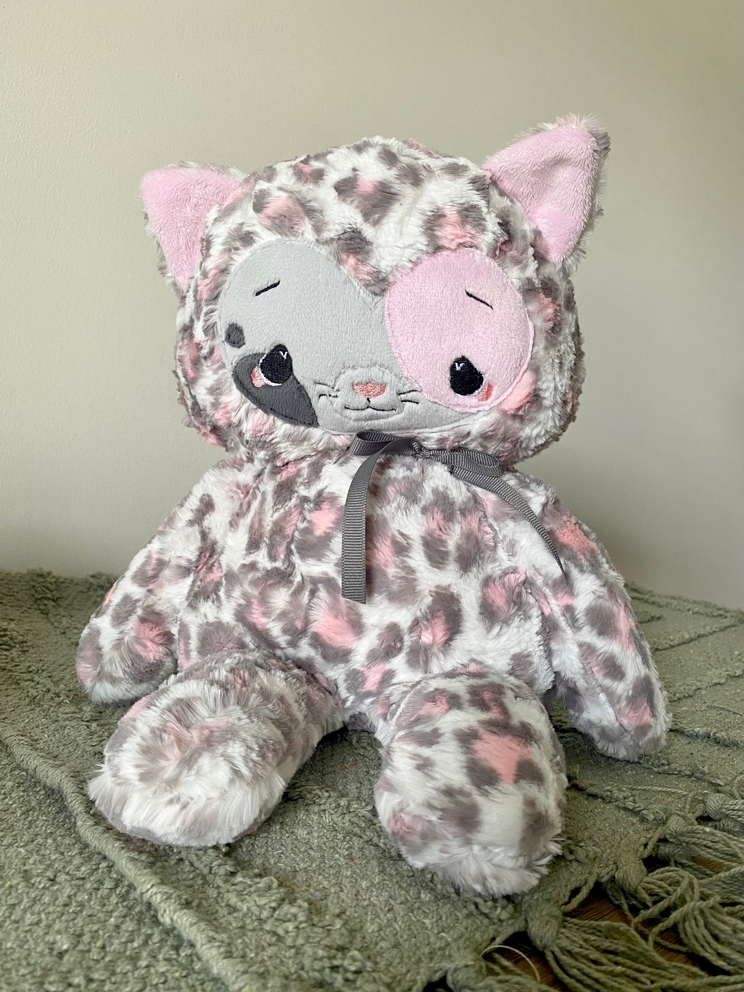 Cleo the pink gray leopard kitty
