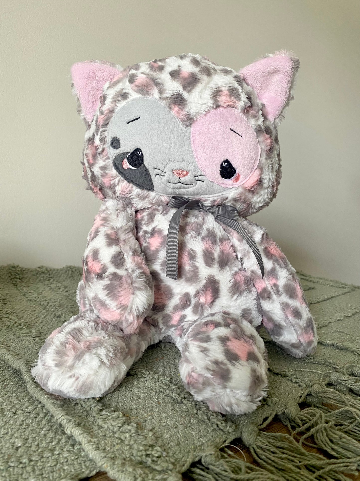 Cleo the pink gray leopard kitty